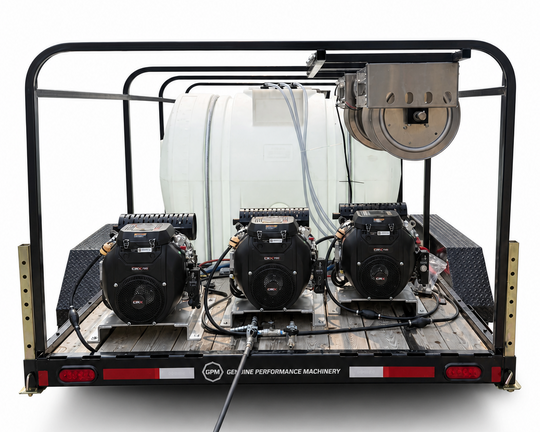 A heavy-duty trailer-mounted performance machinery setup with three black engines, a large white water tank, and a metal drum or filter component under a black frame, photographed on a white studio background.