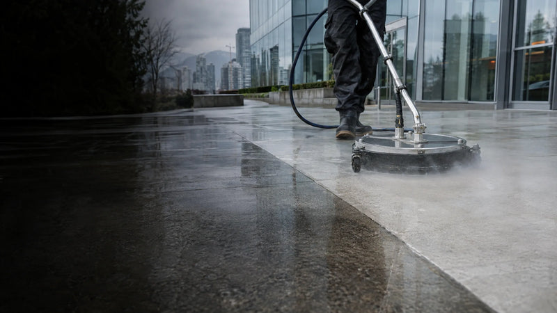 Surface cleaner pressure washing a large commercial concrete plaza